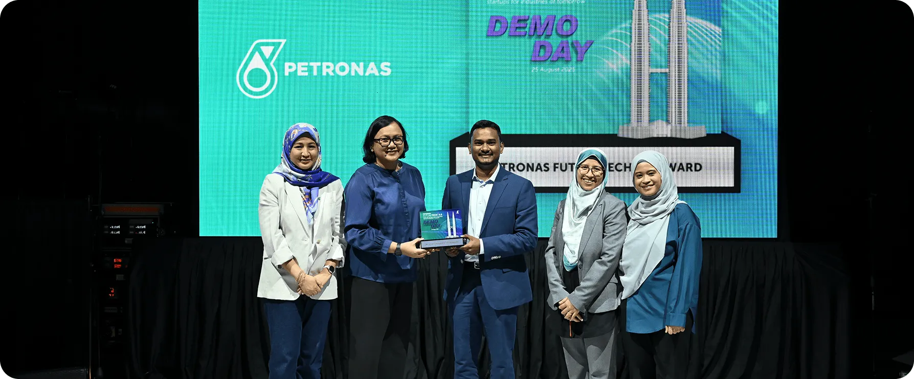 Enygma team celebrating a successful project, showcasing our collaborative and innovative work environment