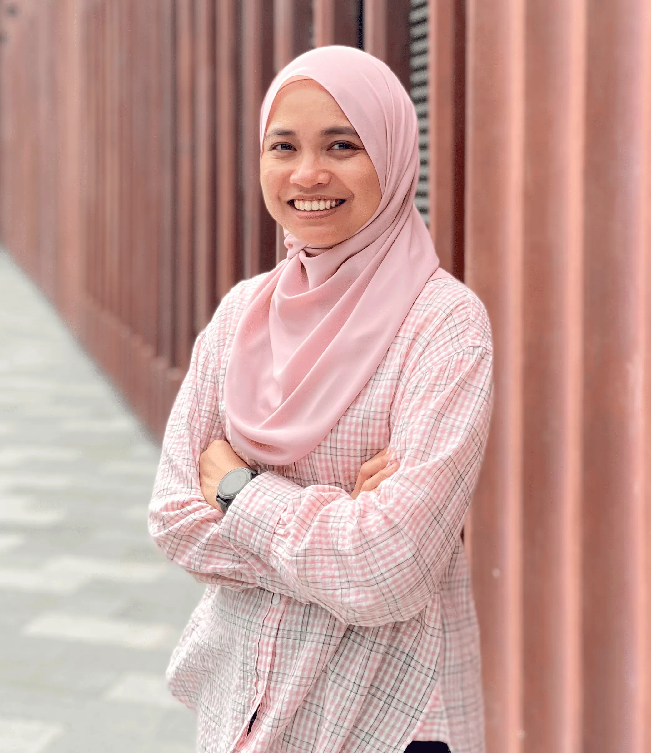 Portrait of Syafiqah Ainuddeen, UI/UX Engineer & Creative Designer of Enygma