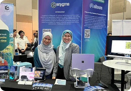 Enygma team member presenting ideas to colleagues